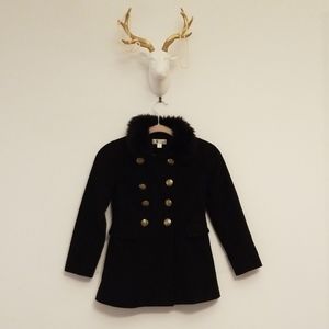Girls black coat with fur collar.